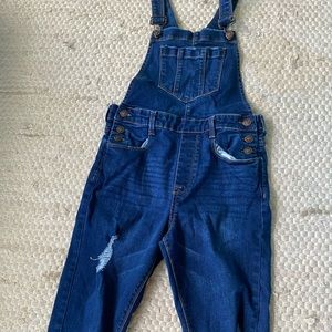 Ripped denim overalls